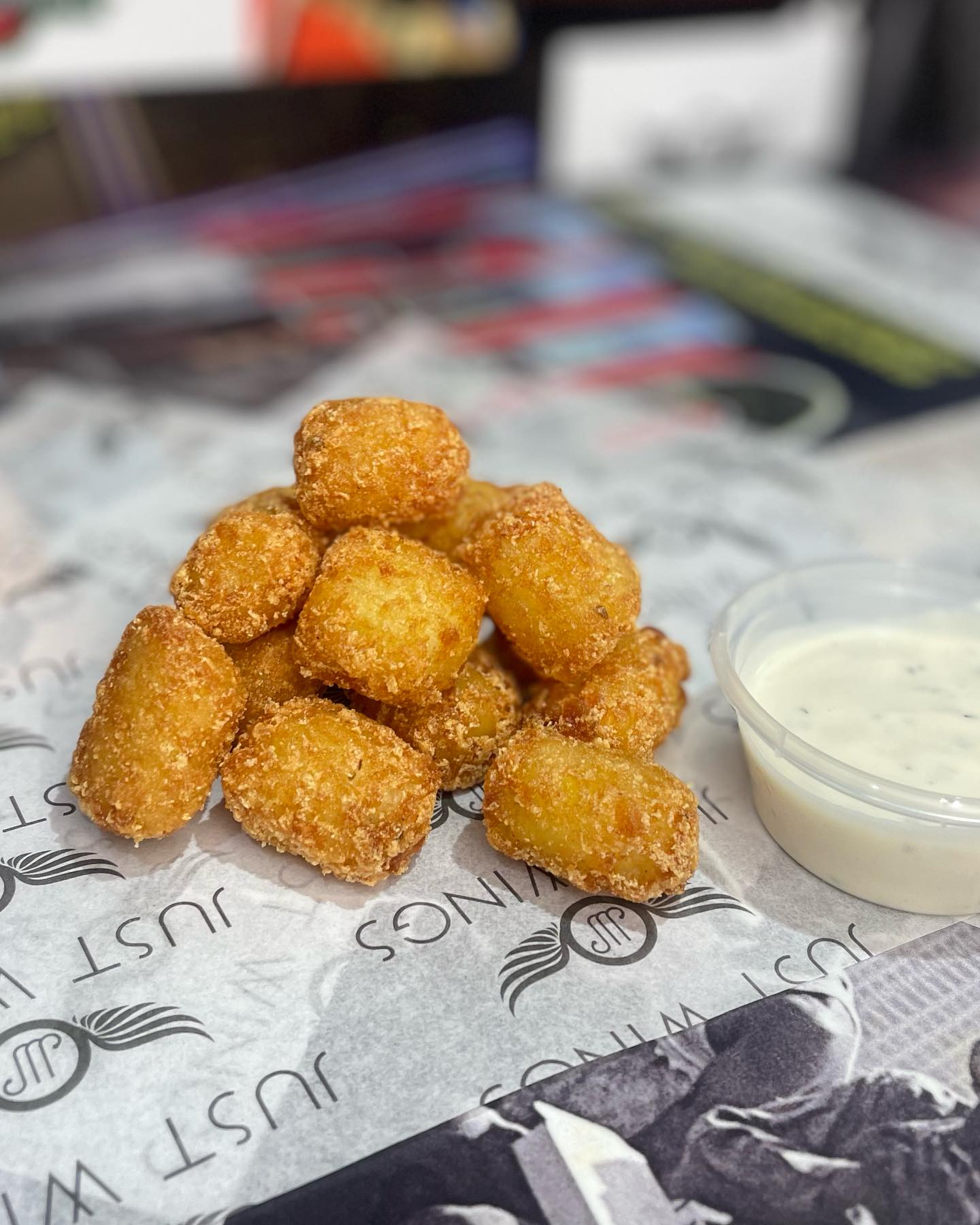 Crispy potato bites with ranch dip